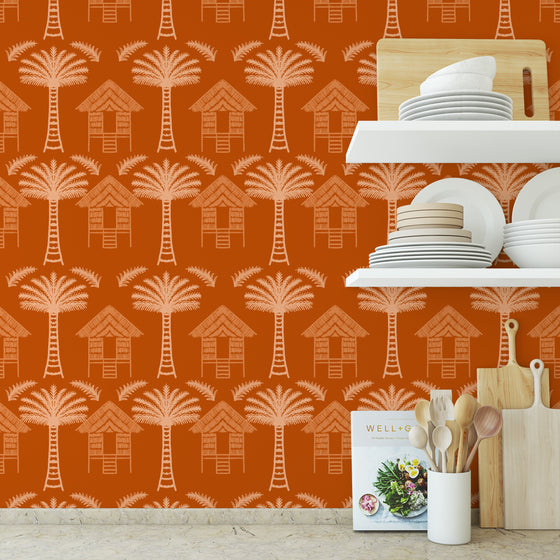 Tropical Huts Wallpaper in Orange by Jenna Hang