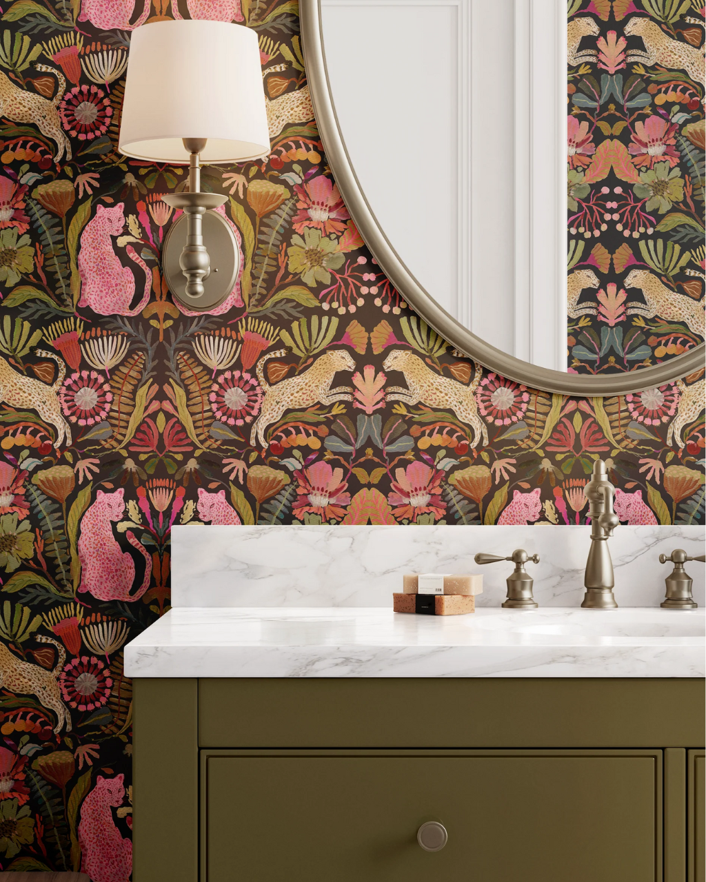 Big Cats wallpaper with surreal hot pink cheetahs prowling through colorful foliage on a dark background, creating a bold statement wall in a styled room interior | Funky Paper Co