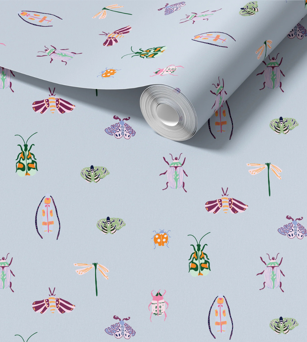 Bugs nursery wallpaper with colorful moths, beetles, and dragonflies on a pastel blue background.