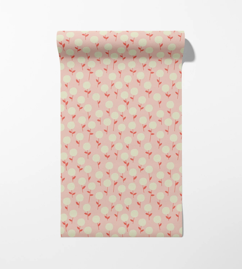Champs Élysées floral wallpaper with cream poppies on a baby pink background in a chic repeat.
