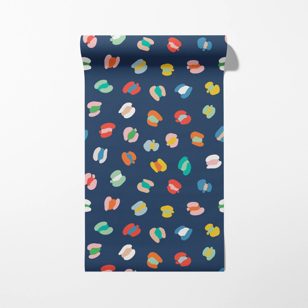 Navy nursery wallpaper with colorful leopard spots for a bold, playful room that grows with kids.
