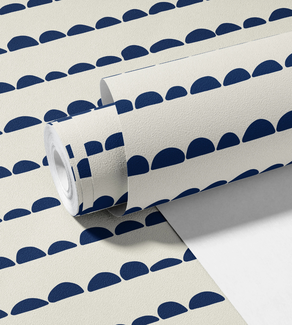 Minimal nursery wallpaper with organic navy bumps forming horizontal lines on a white background.
