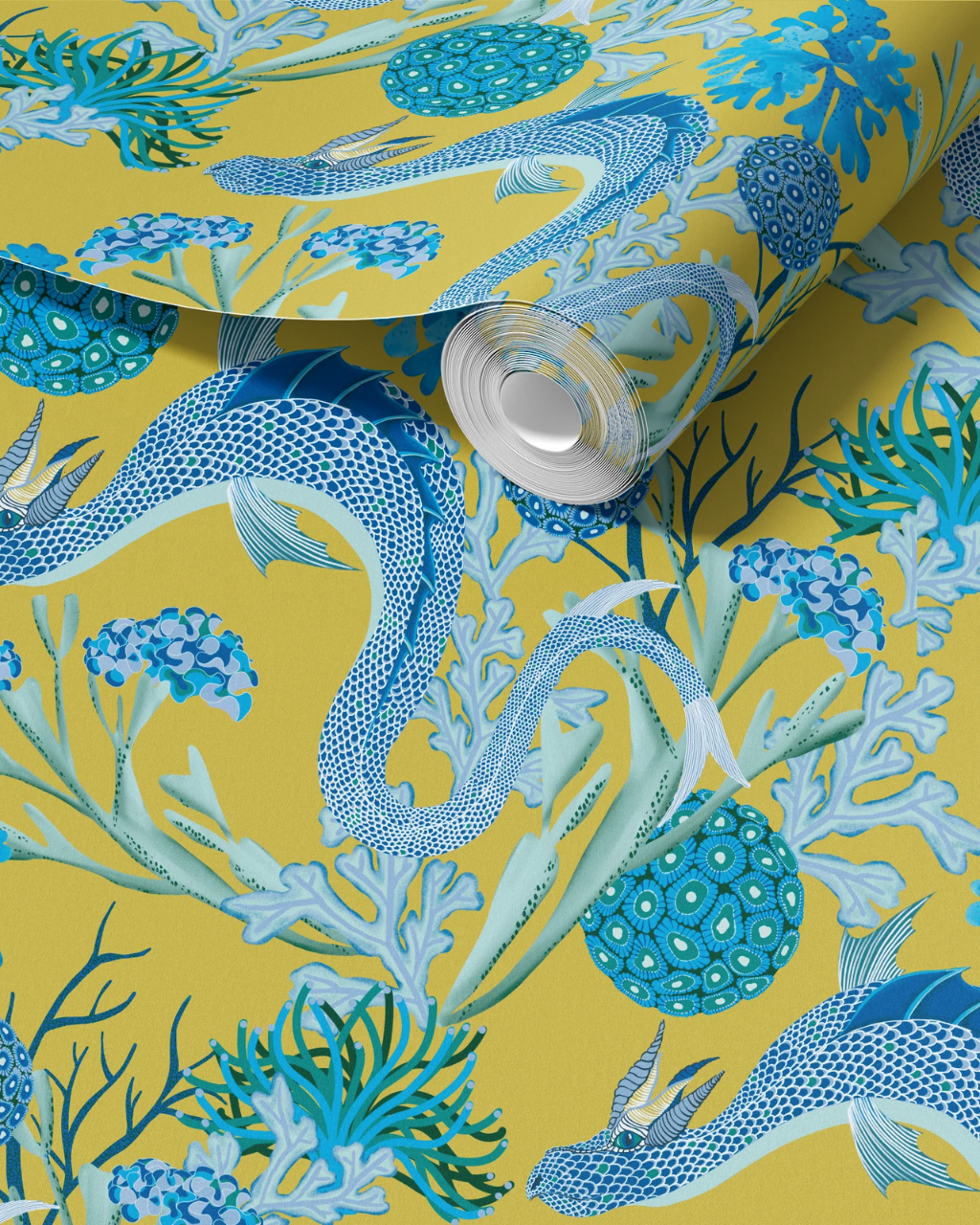 A roll of laundry room wallpaper featuring a vibrant chartreuse background with a detailed blue and teal Sea Dragon pattern, including a large blue fish and coral.