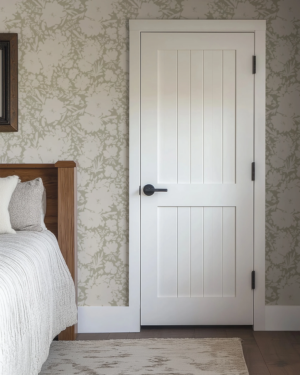 Soft sage neutral wallpaper with oversized beige floral silhouettes styled in a cozy bedroom with white bedding | Neutral Wallpaper Ideas for Every Room in Your Home by Funky Paper Co