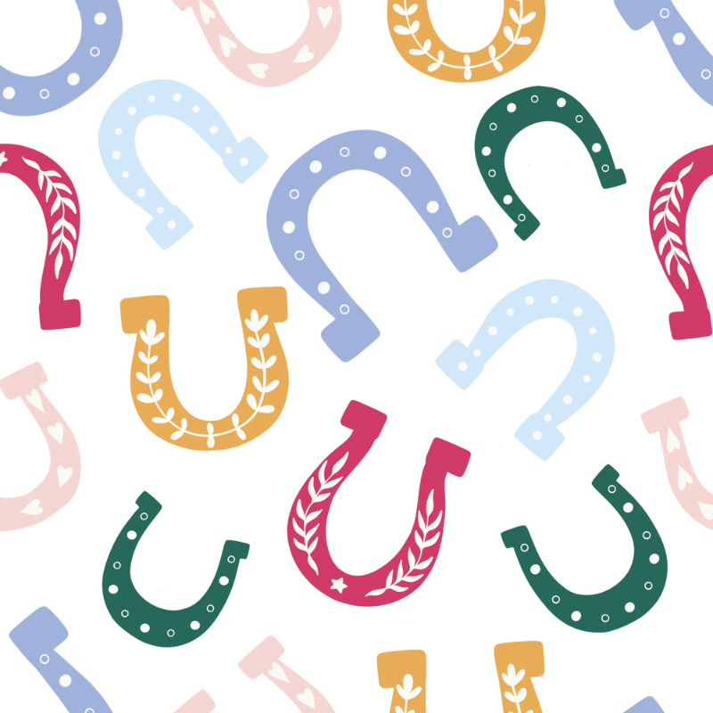 Horseshoes storybook nursery wallpaper with colorful, whimsical horseshoes for a playful western-themed nursery.