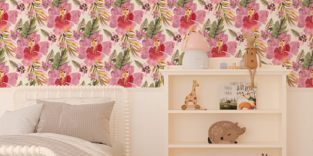 A child's bedroom features a bright Watercolor Hibiscus Delight Wallpaper with large pink and red flowers.